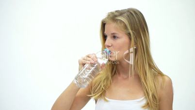 HD1080 Slim fitness blond girl drinking bottle of water. Portrait. Version 2