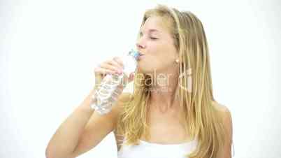 HD1080 Slim fitness blond girl drinking bottle of water. Portrait. Version 1