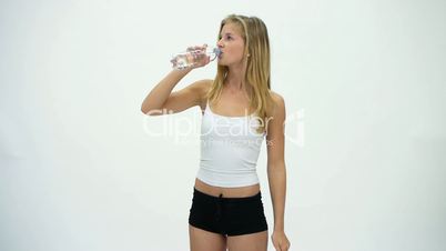 HD1080 Slim fitness blond girl enjoying bottle of water. Version 3