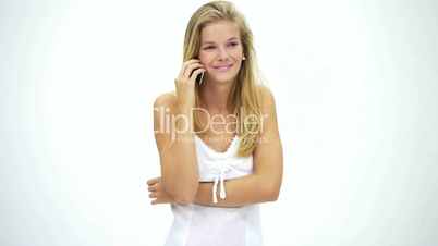 HD1080 Young blond happy woman in white dress talking on cell phone. Version 1