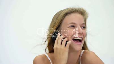 HD1080 Young blond happy woman talking on cell phone. Close Up.