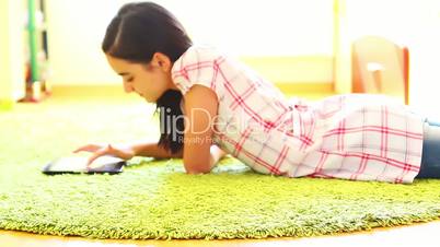 Teenage Girl Using Digital Tablet