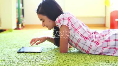 Teenage Girl Using Digital Tablet