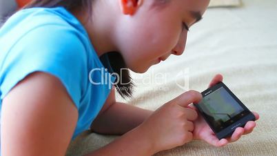 Child having fun with smart phone