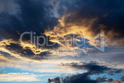 thunderstorm cloud at sunset