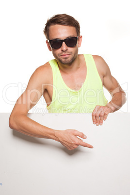 casual man in sunglasses with a blank sign