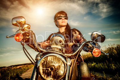 Biker girl on a motorcycle