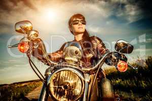 Biker girl on a motorcycle