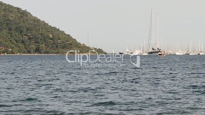 Yachts at the pier on Mediterranean turkish resort, Fethiye, Turkey