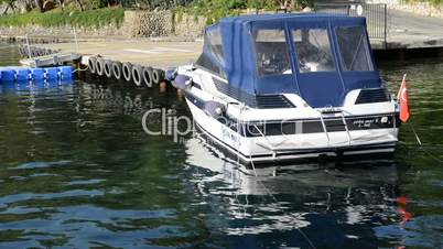 The motor boat near pier on Mediterranean turkish resort, Marmaris, Turkey