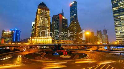 Shanghai skyscraper and city traffic at night