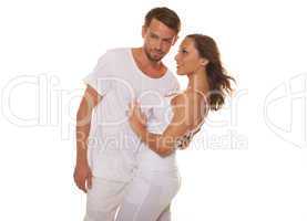 happy couple embracing wearing white