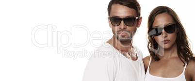 couple wearing sunglasses isolated over a white background