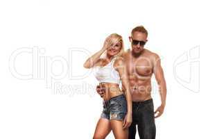 ortrait of young fitness couple on white background
