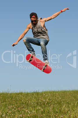 skateboarder leaping in the air