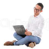 Excited Asian male using laptop