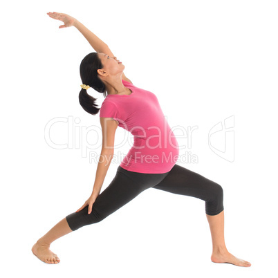 Asian pregnant yoga exercise.