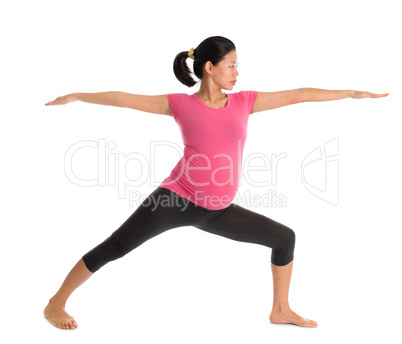 Asian pregnant yoga class.