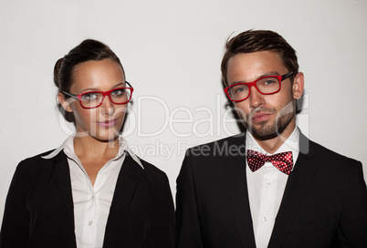 couple of students wearing red glasses