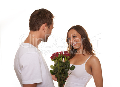 boyfriend giving bunch of flowers to his girlfriend
