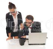 business couple in front of the desk