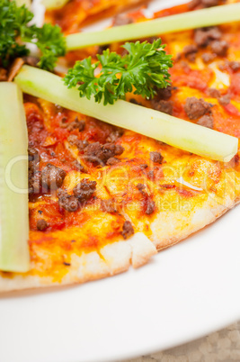 Turkish beef pizza with cucumber on top