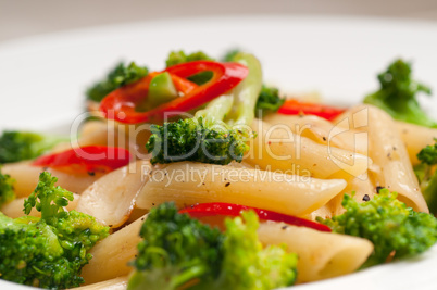 Italian penne pasta with broccoli and chili pepper