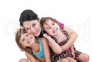 Happy mother and two daughters. Isolated on white background