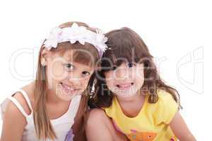 Two little girls, isolated over white