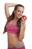 Athletic woman with apple