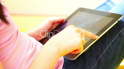 Teenage Girl Using Digital Tablet close up
