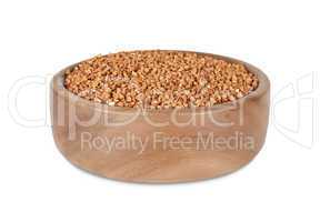 Buckwheat in  wooden bowl