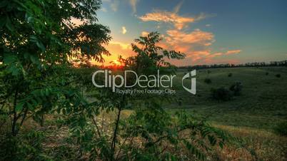 Timelapse Spring Sunset Over Meadow