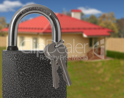 Padlock with house on background, protection of housing concept