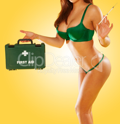 sexy woman carrying a first aid kit