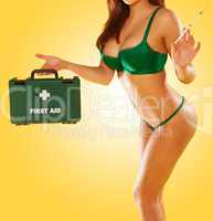 sexy woman carrying a first aid kit