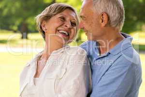 Happy retirement senior couple laughing together
