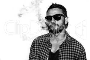 man smoking cigarette black and white portrait