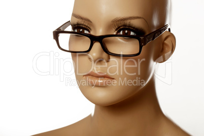 mannequin wearing spec reading glasses on white