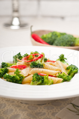 Italian penne pasta with broccoli and chili pepper