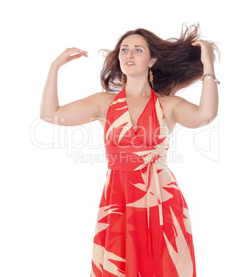 Portrait of a smiling young woman in red dress