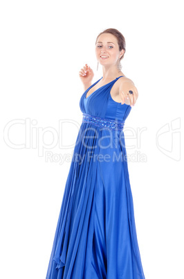 Portrait of a beautiful young woman in blue dress, holds out his