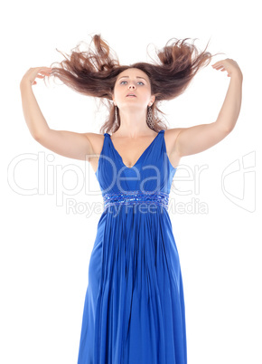 Portrait of a beautiful young woman in blue dress with streaming