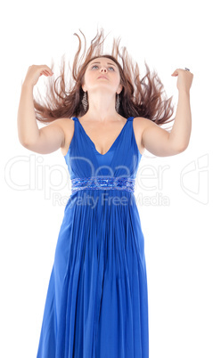 Portrait of a beautiful young woman in blue dress with streaming