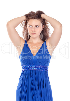 Portrait of a beautiful young woman in blue dress, holding on to