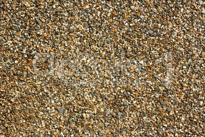 small stones and pebble beach close up