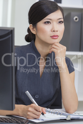 Asian Chinese Woman or Businesswoman in Office