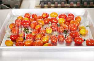 Many colorful Tomato red and yellow on a tray ready to be served