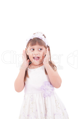 Portrait of emotionally kid. Funny little girl isolated on white