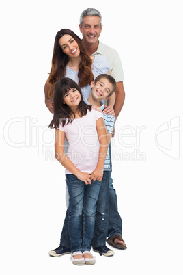 Portrait of a smiling family in single file